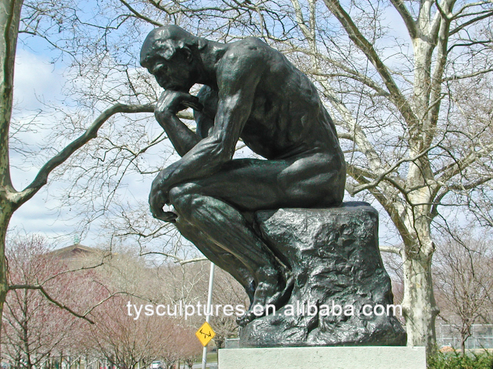 Brass thinker statue